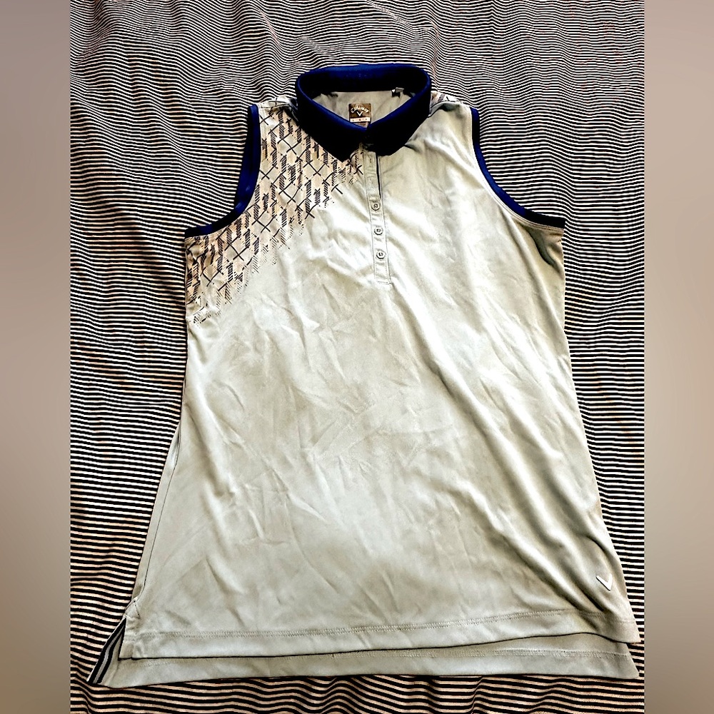 Sleeveless, light blue womens golf polo from Callaway. Performance material.